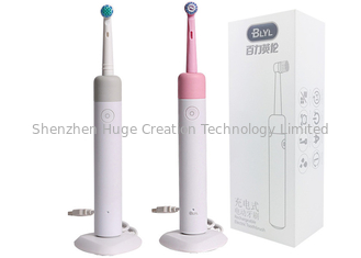 中国 回転式振動の両立性の口頭歯ブラシBの電動歯ブラシのピンクおよび灰色色 サプライヤー